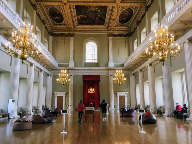 The Great Hall in the Banqueting House. Beanbags are scattered across the floor so that tourists can lie on them and look up at the ornately-painted ceiling, which was painted by Reubens.