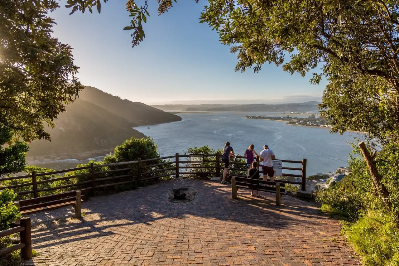 tourists admiring the view at the Knysna Heads in South Africa