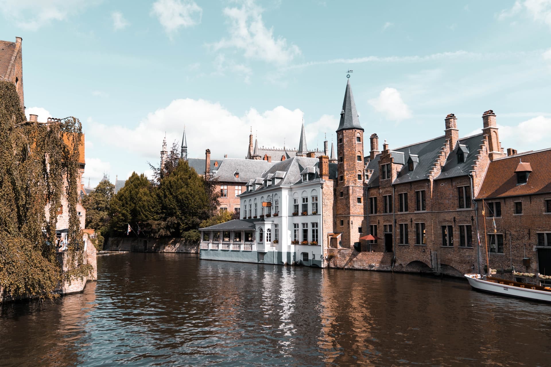 Boat tour in Bruges, Belgium - stop 1 on this one day in Bruges itinerary.