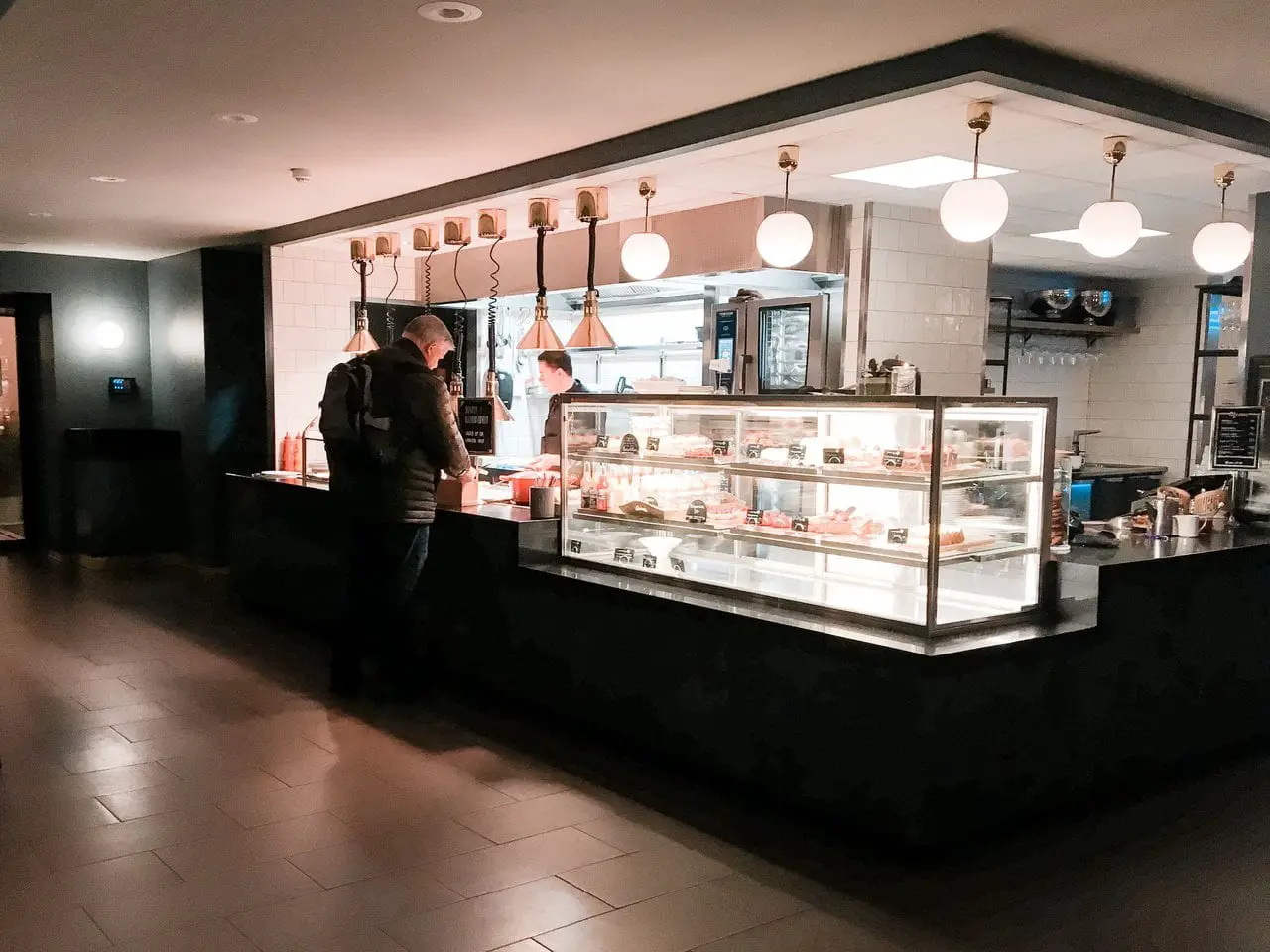 The serving counter inside Kaffistova Restaurant in Oslo Norway.
