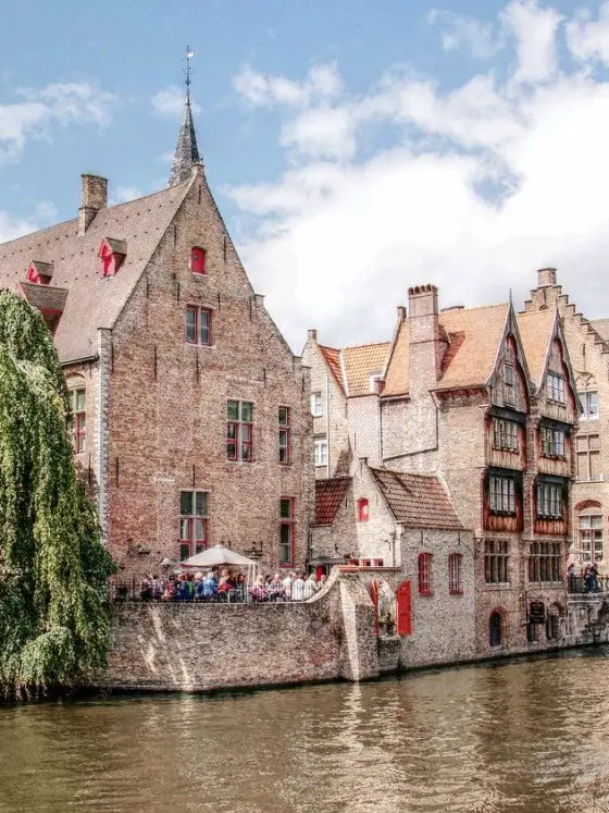 Bruges Belfry from Canal in Belgium