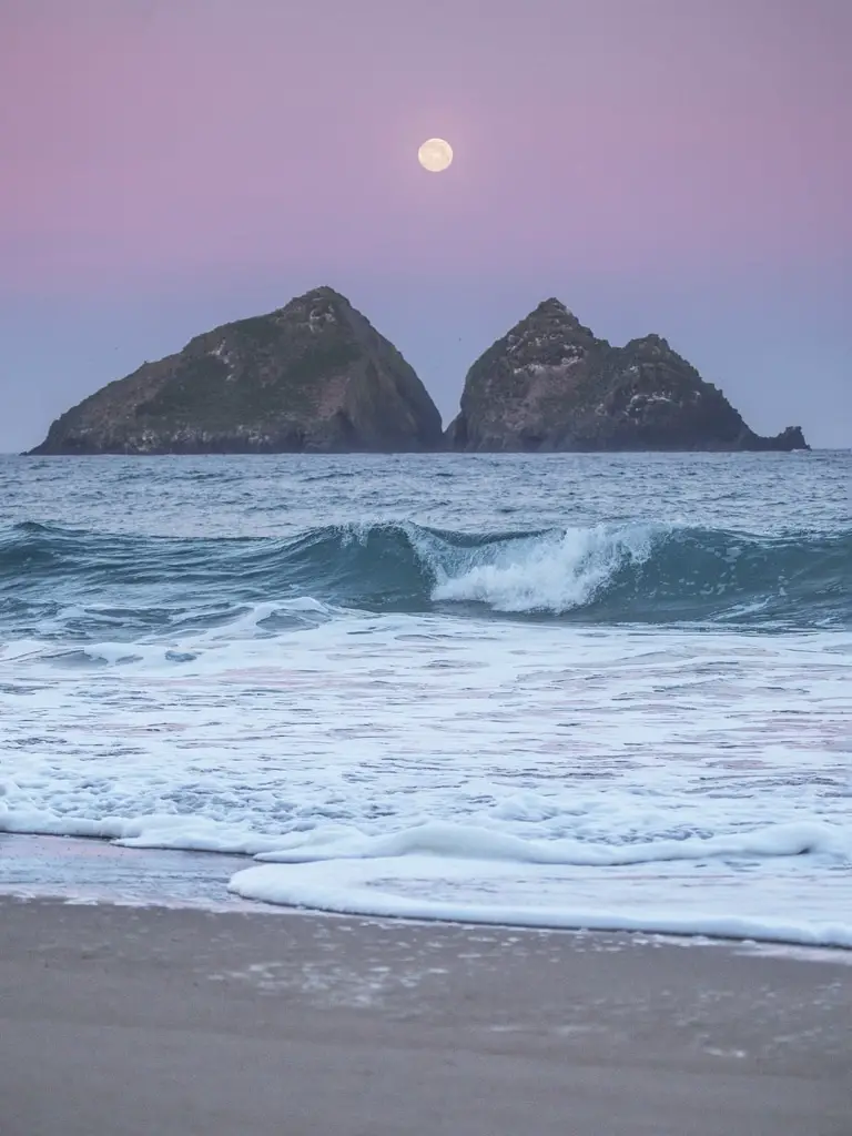 Full moon over Holywell Bay in Newquay Cornwall.