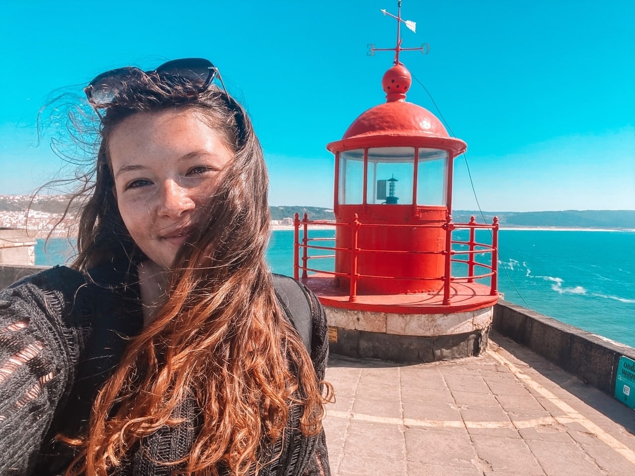 The Nazare lighthouse overlooking Praia do Norte beach.