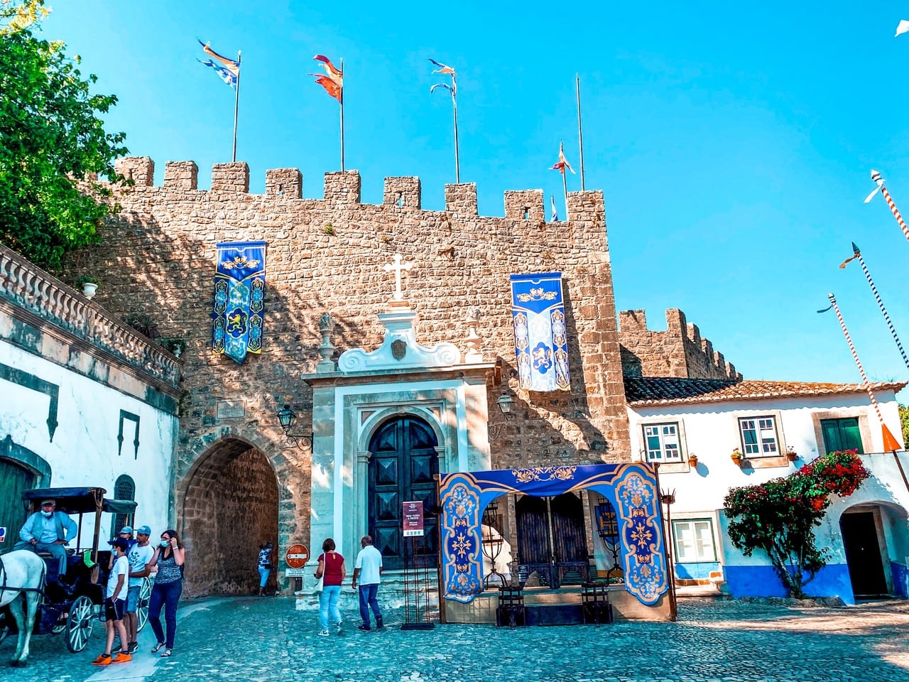 Fortified entrance to the walled medieval town of Obidos, which is a popular destination for a day trip from Lisbon.