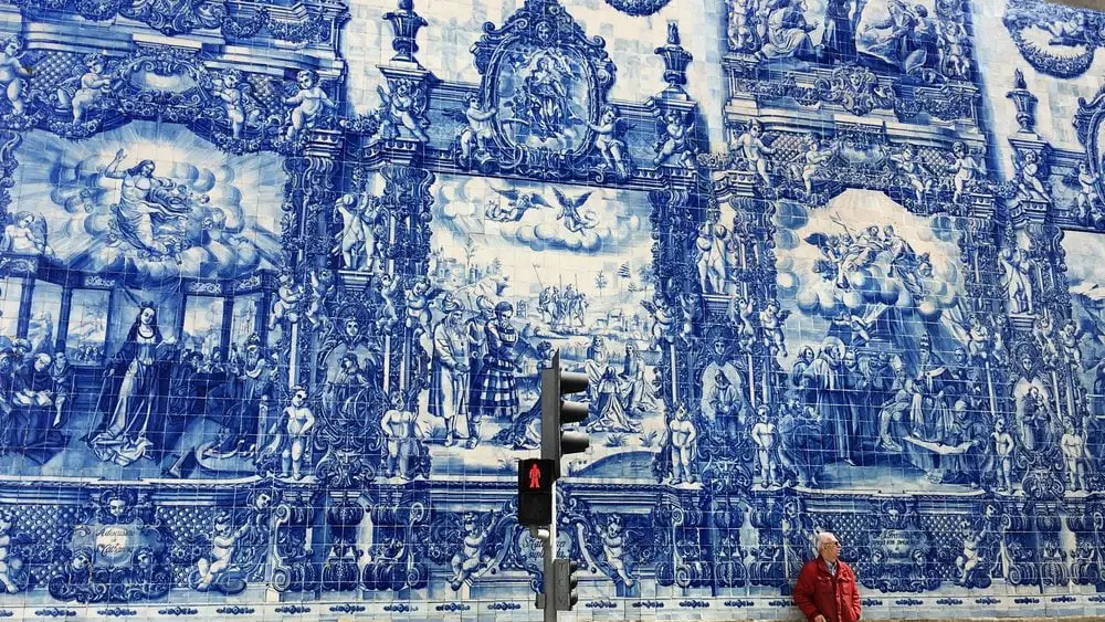 Blue azulejo tiles on the side of a church in Porto Portugal