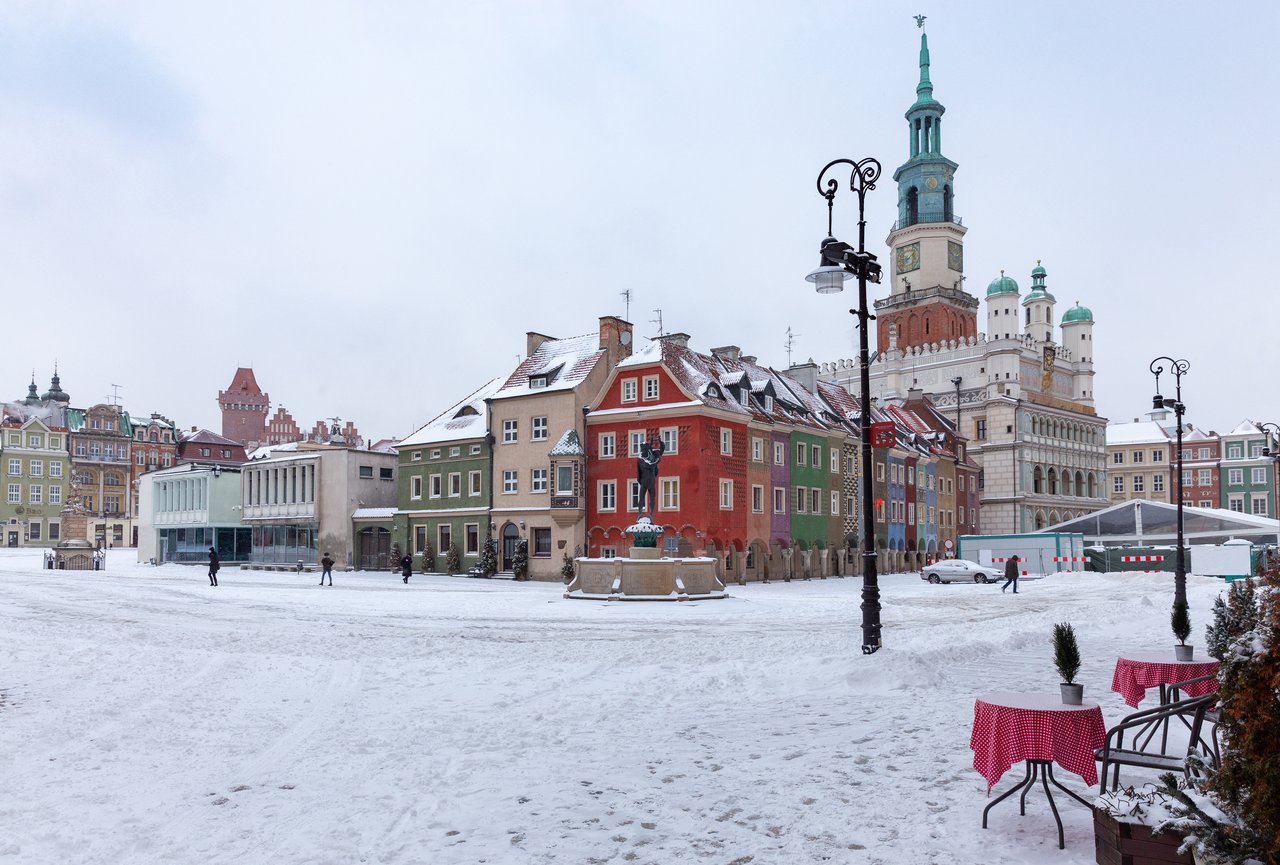 Poznan market square covered in snow in winter.