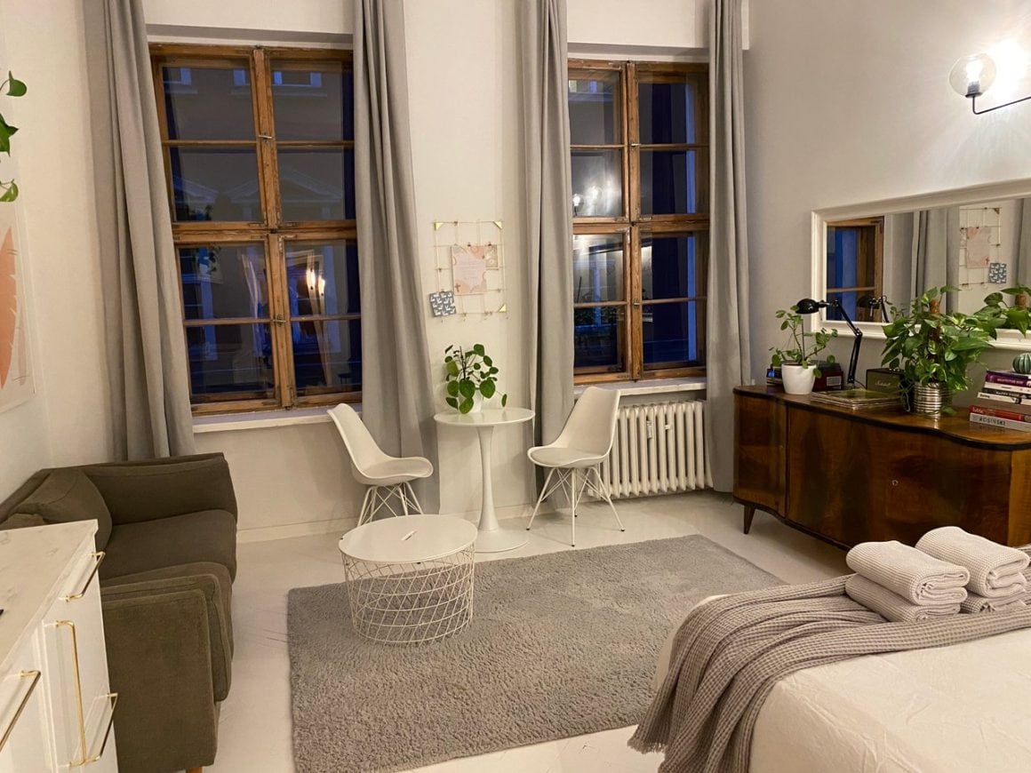 Cosy and modern Airbnb accommodation in Poznan with comfortable bedding and urban decor.