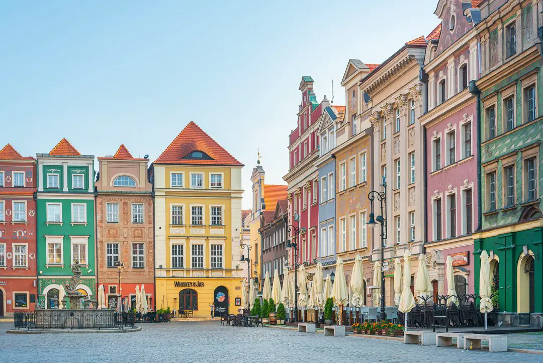 The beautiful old town square in Poznan, lined by the pastel-coloured merchant houses.