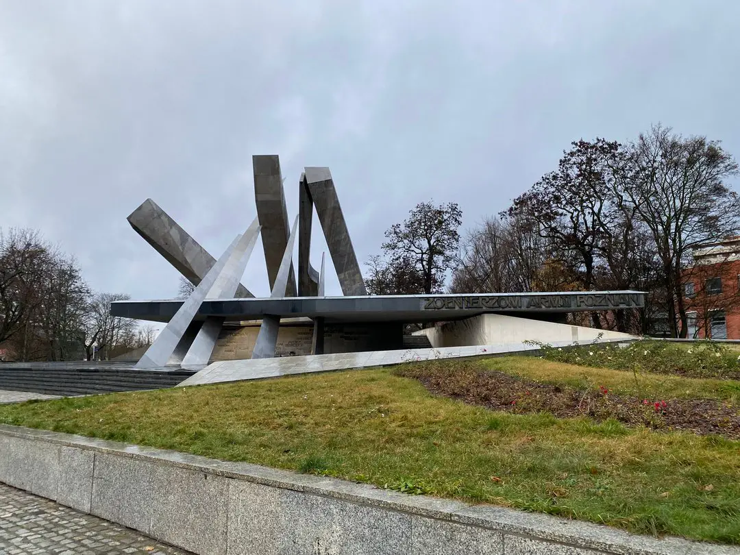 The modernist and abstract Poznan war memorial monument, a significant landmark for those interested in the city's modern history during their visit.