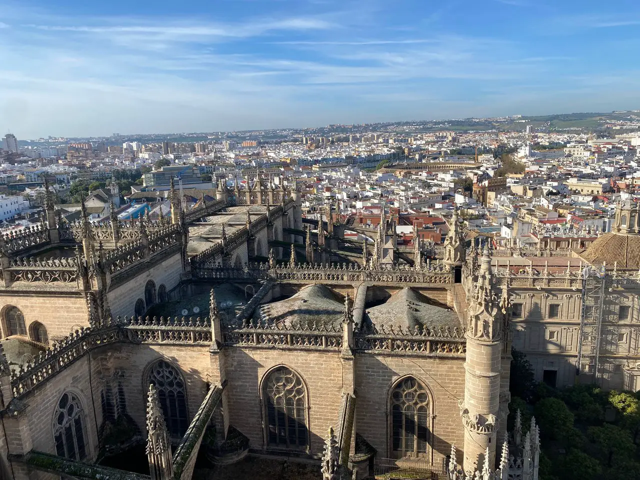 Aerial view of Seville skyline with the Seville Cathedral in the foreground.