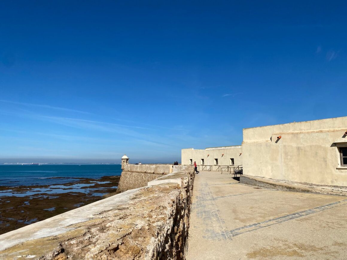 The walls of the Santa Catalina Castle in Cadiz, overlooking the ocean.