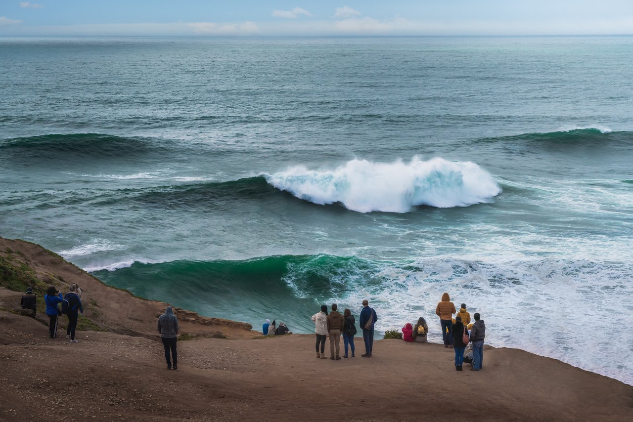 The big waves of Nazare waves in October, as seen from the Nazare big wave lookout point