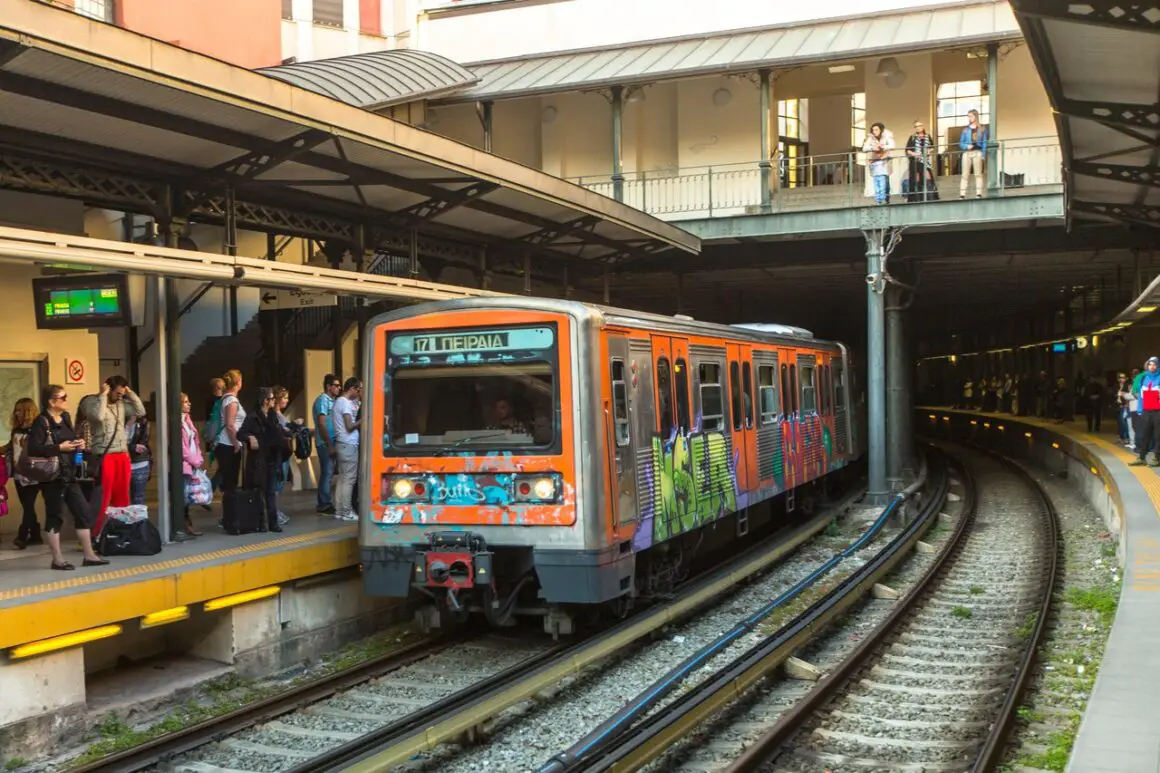 Athens metro train pulling into platform.