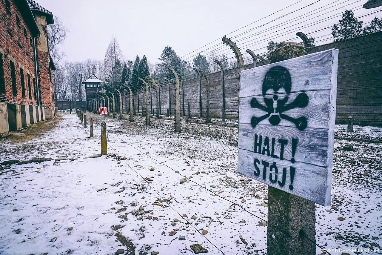 Skull sign saying "stop" at Auschwitz Birkenau concentration camp, one of the best places to visit near Krakow Poland