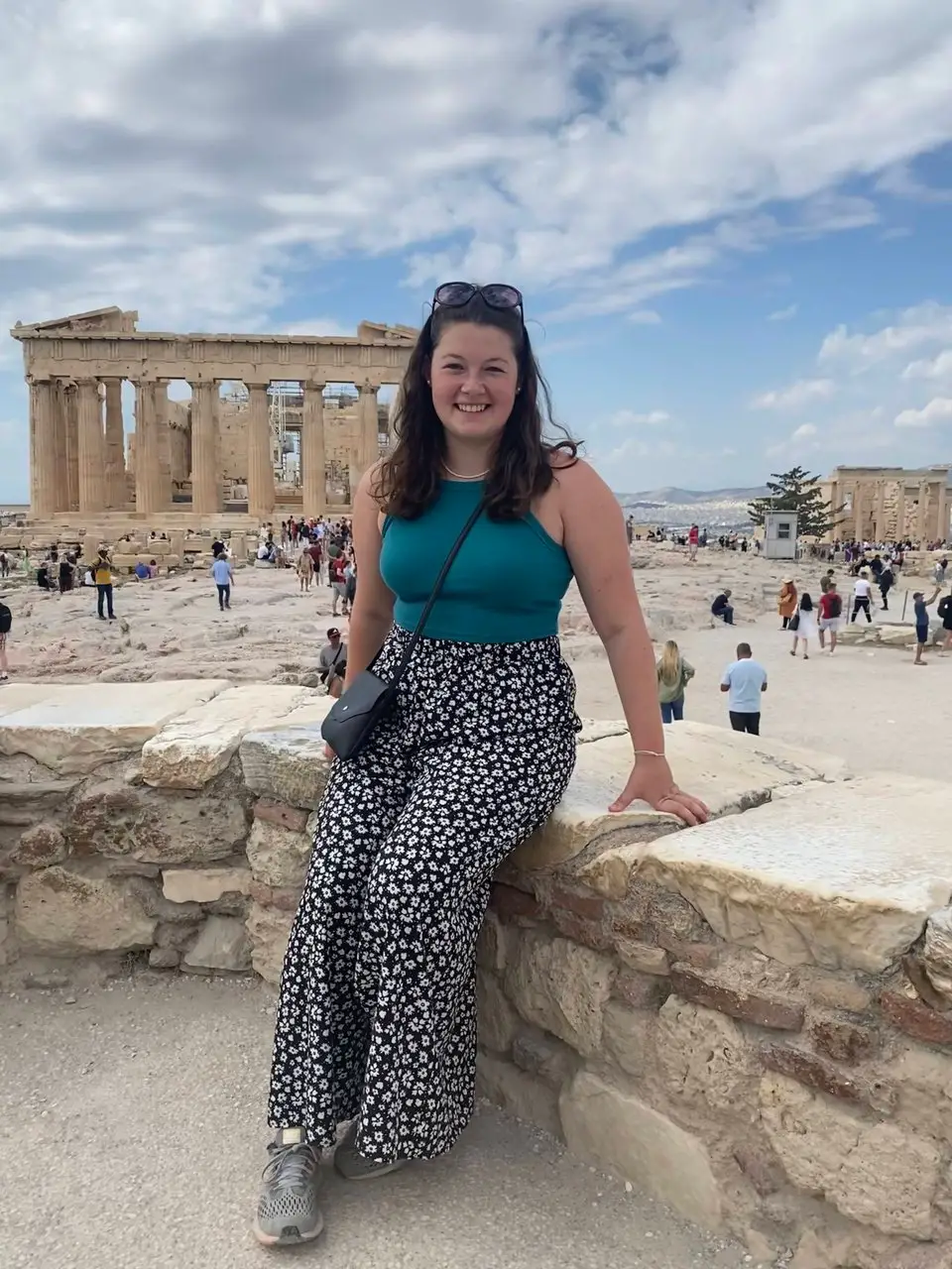 Ella standing in front of the Parthenon in Athens
