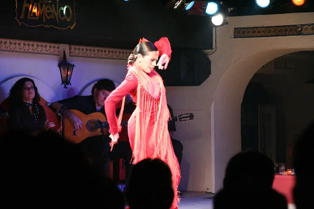 Flamenco dancer wearing a red dress