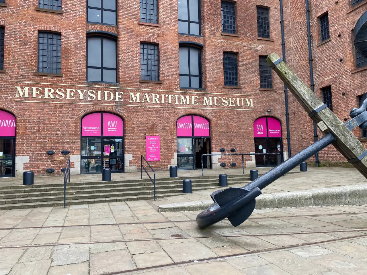 Merseyside Maritime Museum from the outside, one of the best free museums in Liverpool. You can see a huge anchor in front of the museum.