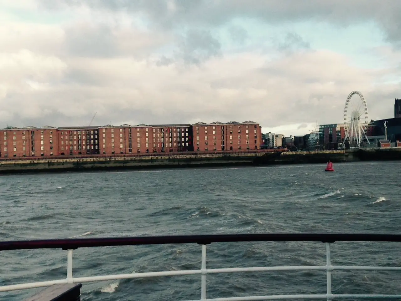 Photo taken from a Mersey River Ferry ride I took in January, with choppy waters and cloudy skies. The Albert Dock and Liverpool Wheel are in the distance. Cold winter weather is one of the reasons you may think Liverpool is not worth visiting.
