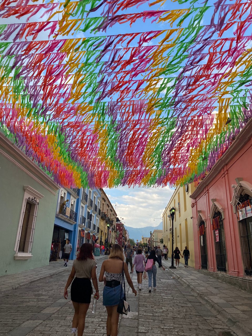 Rainbow bunting lining the streets in Oaxaca Mexico